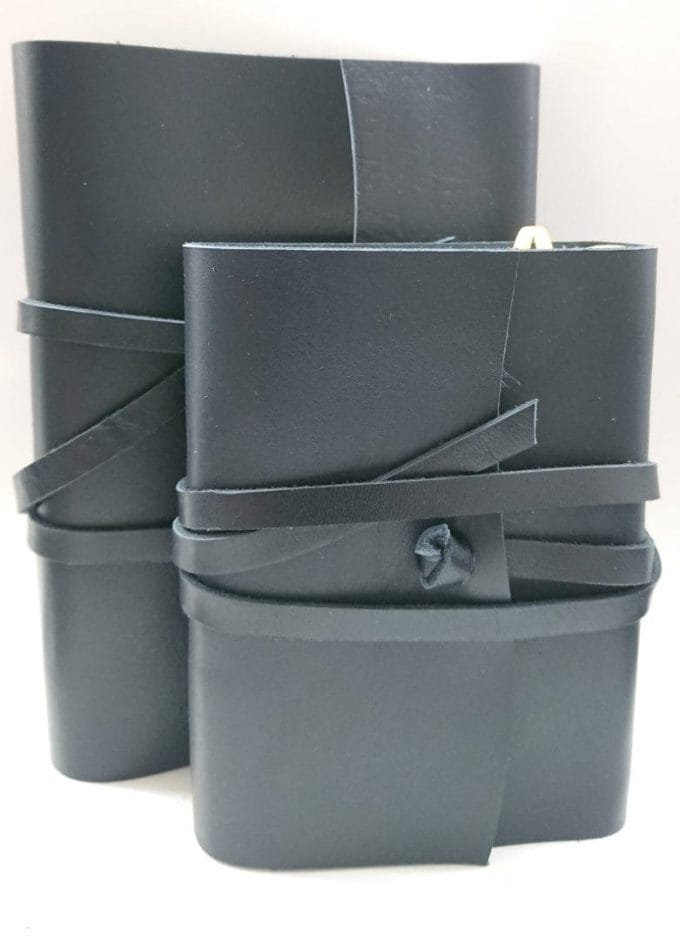 Hand bound diary in leather with ivory Amalfi paper inside.