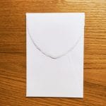 Busta verticale in carta d'Amalfi colore avorio. Misura 12x18