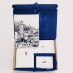 Deluxe Amalfi paper gift boxes containing cards, envelopes, cards and a 100% cotton paper sketchbook for art and writing.