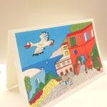 Cartolina in carta di Amalfi con illustrazione c'era una volta Ravello in stile ceramica vietrese del panorama di Ravello.