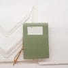Gift idea in Amalfi paper. Handmade paper sheets and envelopes in addition to a handmade bound notebook with green cover