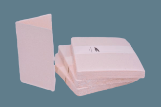 Cover for mass booklets in pink Amalfi paper with straw.