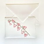 Placeholder with handmade engraving in floral theme and Amalfi paper envelope
