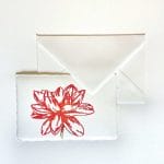 Handmade Amalfi paper table marker and envelope with hand engraved floral print.