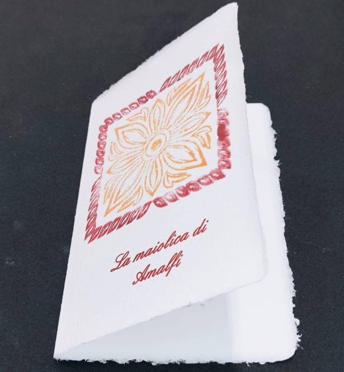 Folding card in Amalfi paper with bordeaux majolica