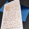 Folding Christmas cards made of Amalfi paper. The decoration is handmade with gold embossing and represents part of the lyrics of the Christmas song "Jingle bells".