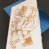 Amalfi paper folding cards with handmade illustration with handmade relief gilding. On the front of the card the illustration entitled "Santa Claus is coming to town".