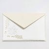 Folding cards decorated with an openwork of a daisy flower and blue envelopes in Amalfi paper. Envelope size: 14*9 cm. Card size. 13*8 cm.