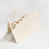 Placeholder for wedding made of ivory pink perforated Amalfi paper. The decoration of a rose, is handmade by the artistic workshop of Lo Scrigno di Santa Chiara.
