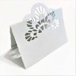 Table marker for wedding in ivory color Amalfi paper. The fretwork is inspired by a peacock tail. Pearl grey color.