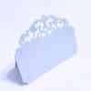 Place marker in Amalfi paper with baroque style fretwork. Pearl grey color.