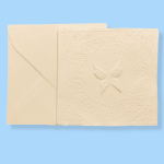 Elegant invitations in ivory pink Amalfi paper with reliefs handmade by Lo Scrigno di Santa Chiara. The decoration of this model depicts a butterfly ready to take flight.