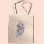 Lo Scrigno di Santa Chiara's tote bag with decoration made from a watercolor from its art workshop.